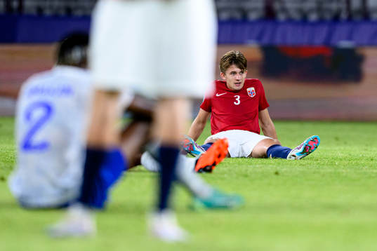Henrik Heggheim of Norway looks dejected