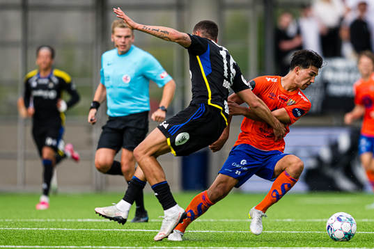 Samual Rogers of Rosenborg and Bjørn Martin Kristensen of