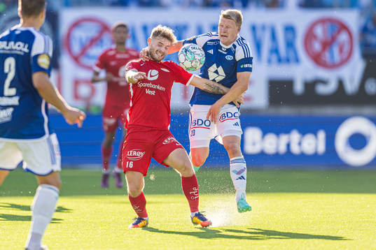 Ole Didrik Blomberg of Brann and Kristian Eriksen of Molde