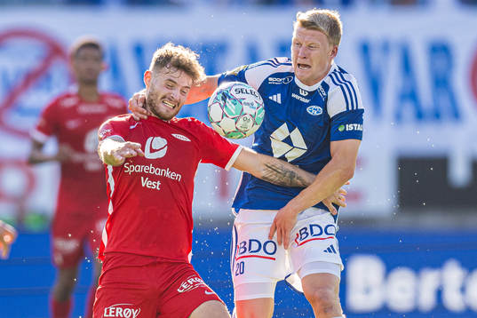 Ole Didrik Blomberg of Brann and Kristian Eriksen of Molde