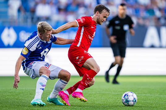 Kristian Eriksen of Molde and Bård Finne of Brann