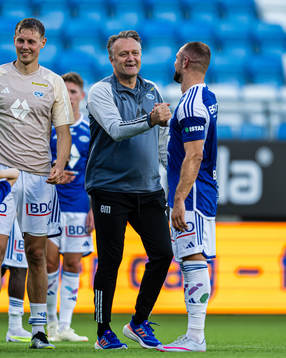 Erling Moe, head coach of Molde, and Veton Berisha of Molde
