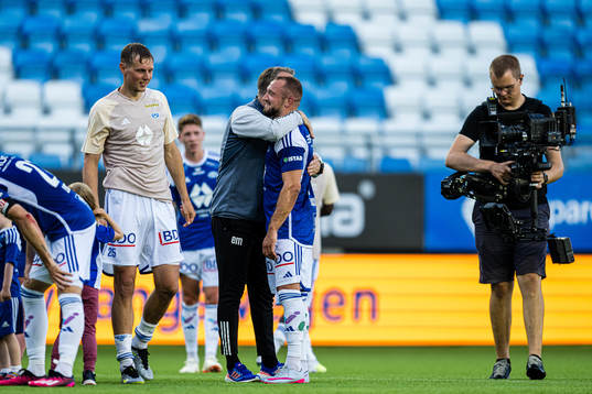 Erling Moe, head coach of Molde, and Veton Berisha of Molde