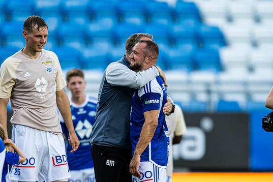 Erling Moe, head coach of Molde, and Veton Berisha of Molde