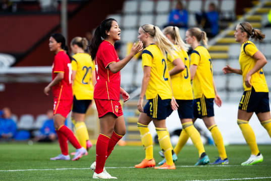 Nan Guo of China looks dejected