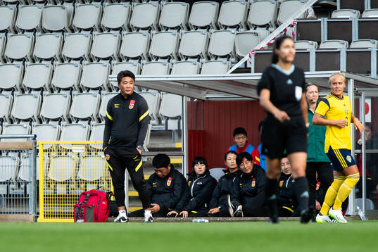 Head coach Wang Jun of China