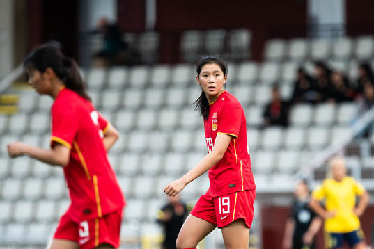 Jiayu Lu of China looks dejected
