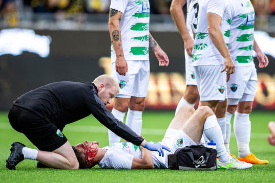 Josh Daniels of The New Saints recieves medical attention