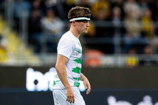 Josh Daniels of The New Saints leave the pitch injured