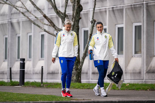 Lina Hurtig and goalkeeper Zecira Musovic of the Swedish