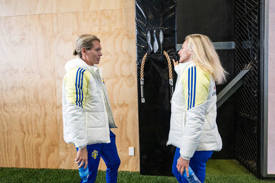 Goalkeeper Jennifer Falk and Rebecka Blomqvist stand next