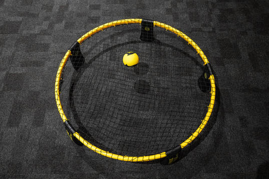 A spike ball game in the changing room