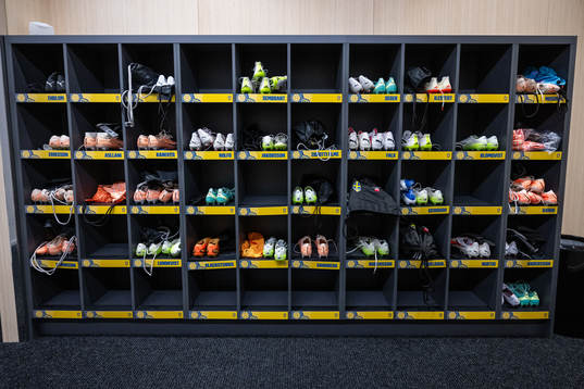Football shoes belonging to players of Sweden in shelves
