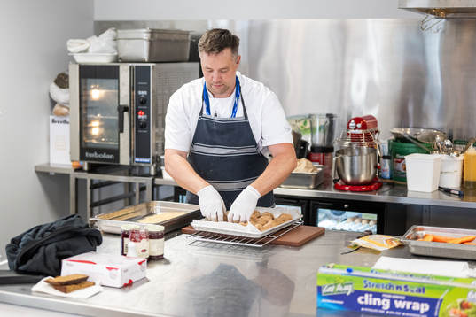 Chef Dick Broström cooks