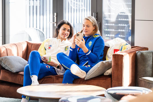 Goalkeeper Zecira Musovic and Magdalena Eriksson sit in the