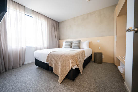 A bedroom in an apartment