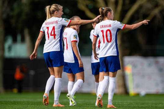 Caroline Graham Hansen of Norway with teammate Ada Hegerberg