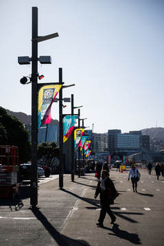 Banners for the FIFA Women's World Cup is seen among people