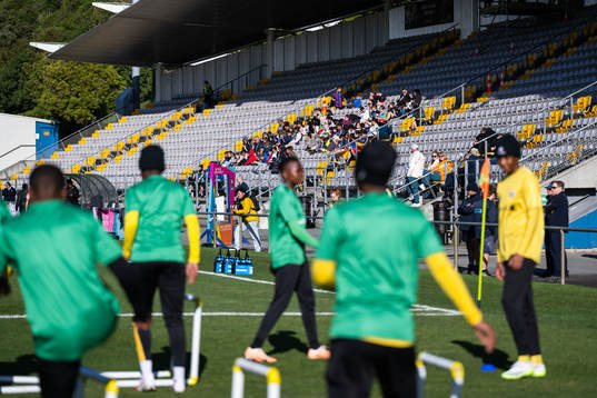 Children in the stands at a training session with the South