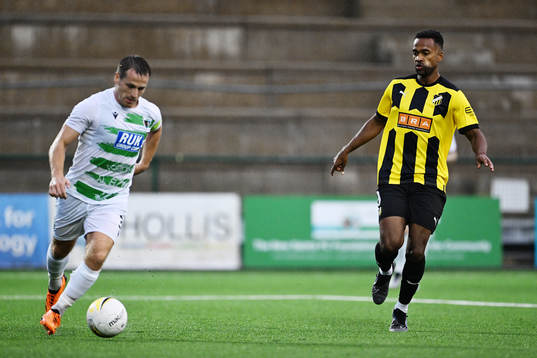 Chris Marriott of The New Saints and Ola Kamara of BK