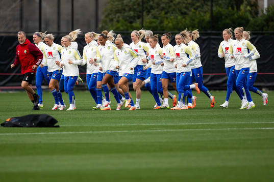 Players of the Swedish women's national football team warm
