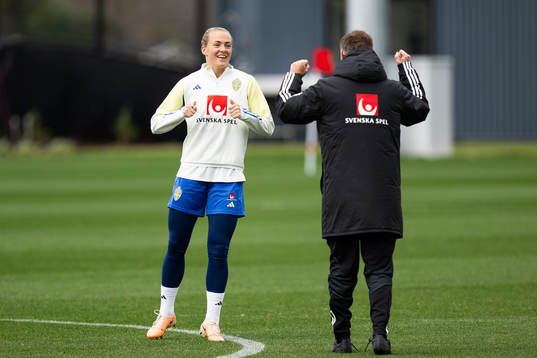 Magdalena Eriksson and head coach Peter Gerhardsson of the