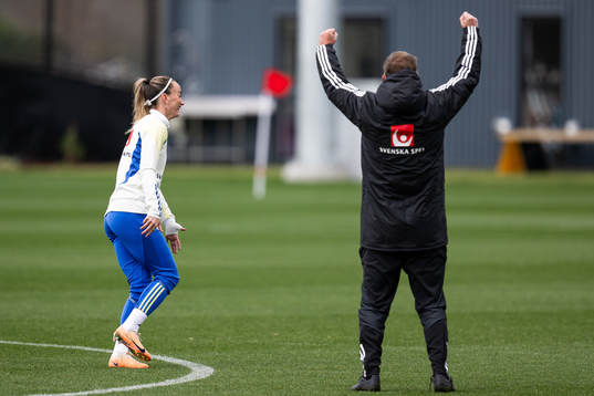 Head coach Peter Gerhardsson celebrates next to Kosovare