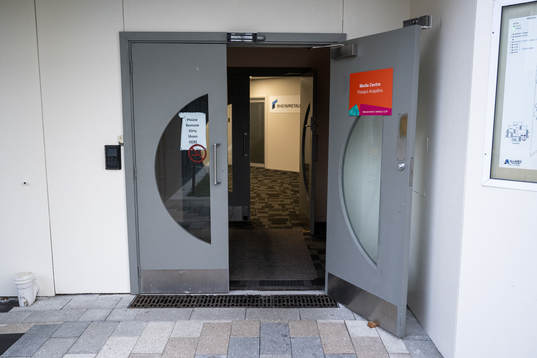 The entrance to the media centre at NZCIS, the base camp of