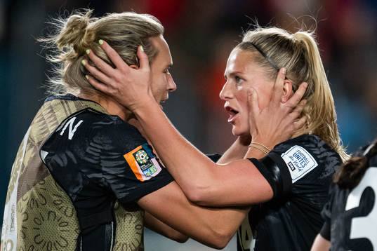 Hannah Wilkinson and Katie Bowen of New Zealand celebrate