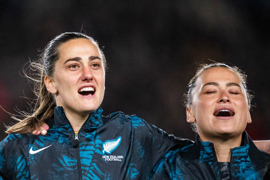 Goalkeeper Victoria Esson and Ali Riley of New Zealand