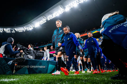 Ria Percival of New Zealand enters the pitch