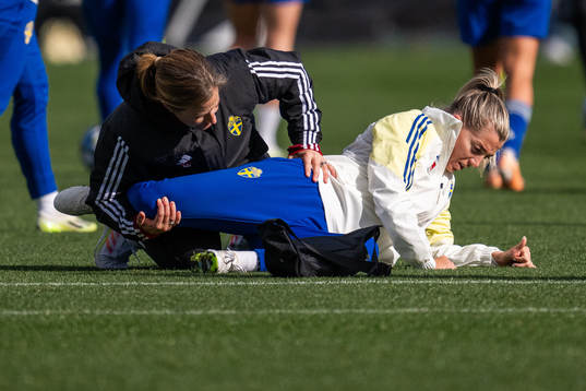 Physio Jenny Larsson treats Linda Sembrant of the Swedish