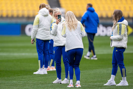 Rebecka Blomqvist takes a picture of Sofia Jakobsson of the