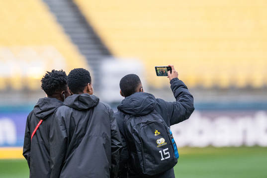Refiloe Jane takes a picture with team mates of the South