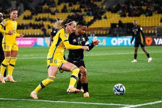 Kosovare Asllani of Sweden and Refiloe Jane of South Africa
