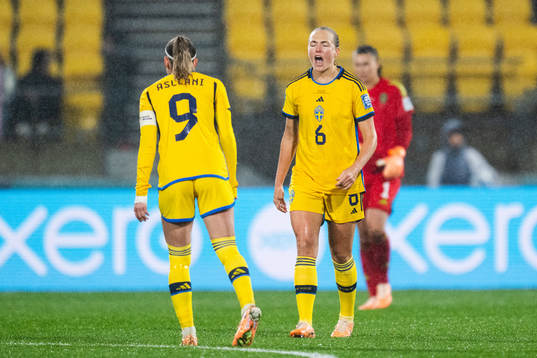 Kosovare Asllani and Magdalena Eriksson of Sweden look