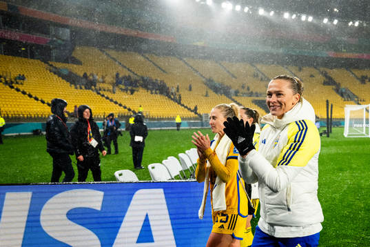 Rebecka Blomqvist and Fridolina Rolfö of Sweden celebrate
