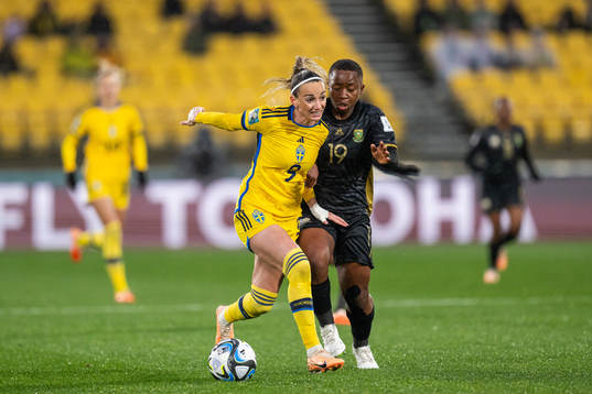 Kosovare Asllani of Sweden and Kholosa Biyana of South