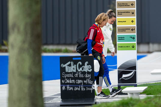 Physio Annica Näsmark and Kosovare Asllani of the Swedish