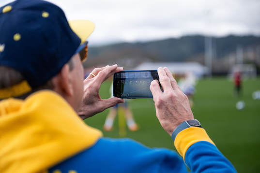 Berndt Olsen takes a photo at a training session of the