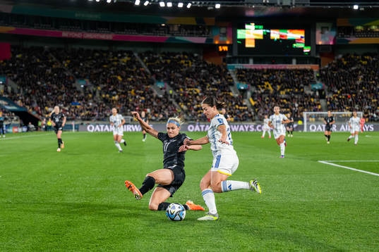 Hannah Wilkinson of New Zealand Angela Beard of Philippines