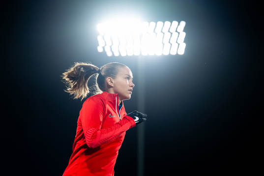 Guro Reiten of Norway warms up