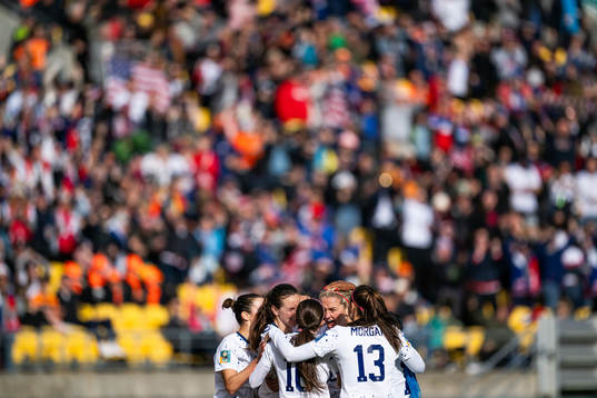 Lindsey Horan of USA celebrates with team mates
