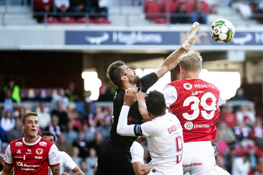 Goalkeeper Stanislav Buchnev of Pyunik  and Lars Saetra of