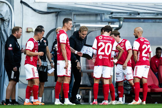 Henrik Jensen, head coach and players of Kalmar