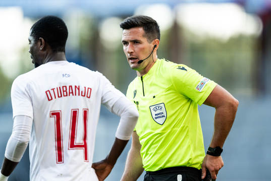 Yusuf Otubanjo of Pyunik and referee Ian McNabb