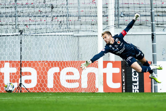 Luka Juricic of Pyunik scores 1-1 behind goalkeeper Ricardo