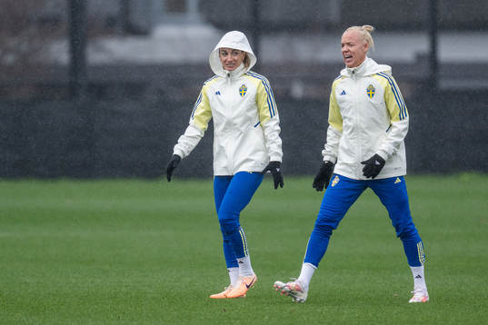 Kosovare Asllani and Caroline Seger of the Swedish women's