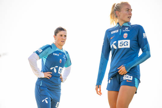 Maren Mjelde and Guro Bergsvand of the Norwegian women’s
