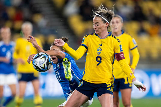 Lisa Boattin of Italy and Kosovare Asllani of Sweden